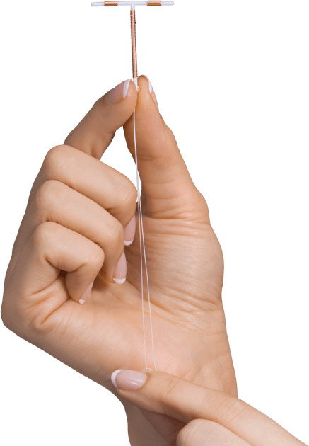 hand holding a paragard iud closeup