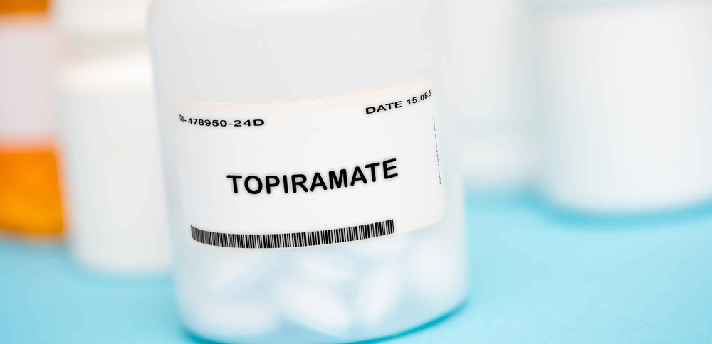 closeup of a generic bottle containing epilepsy treatment drug topiramate
